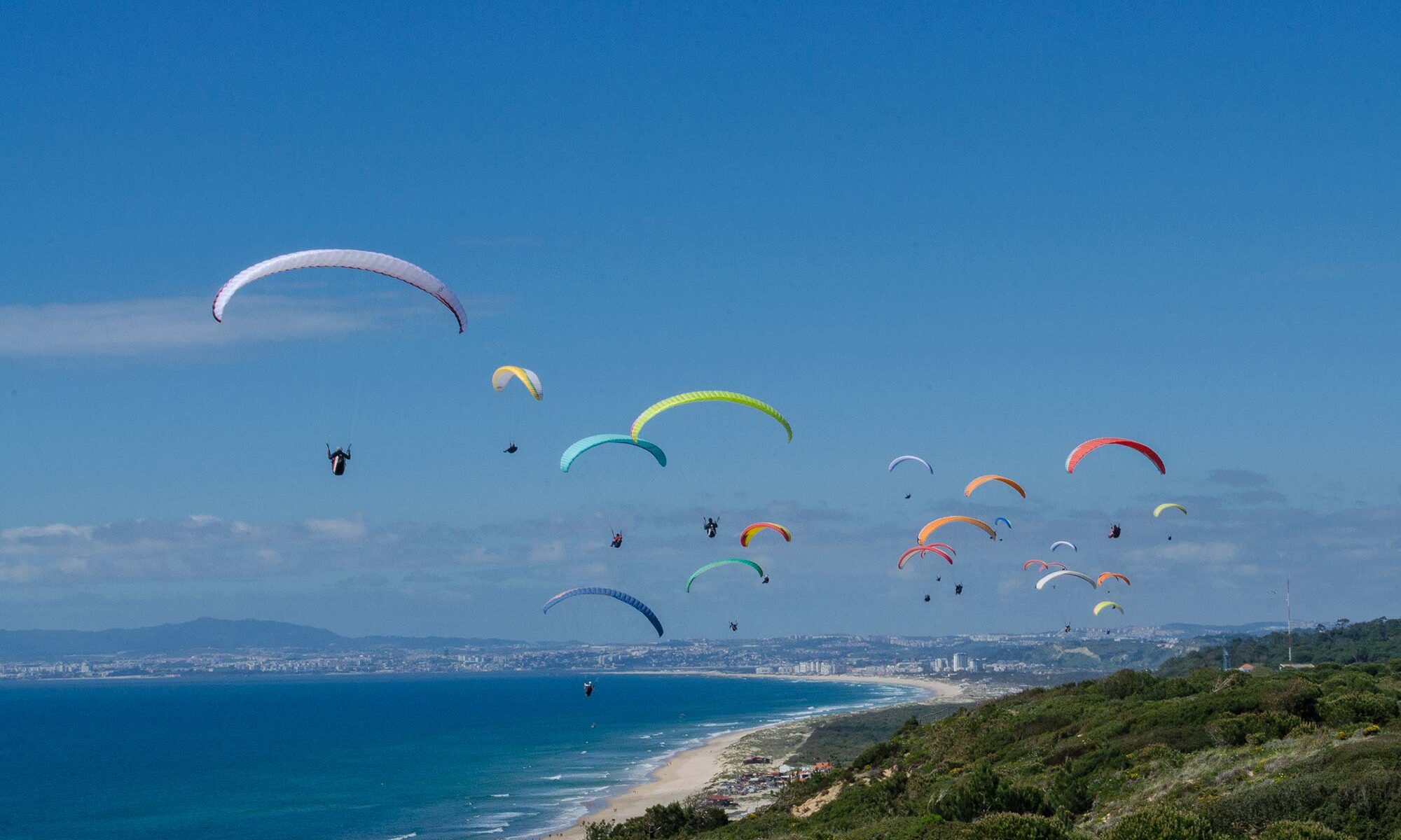 Paragliders at Costa da Caparica